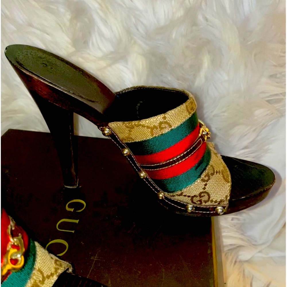 GUCCI
Beige/Ebony GG Canvas Vintage Web Horsebit Wood Mule Slide Sandals